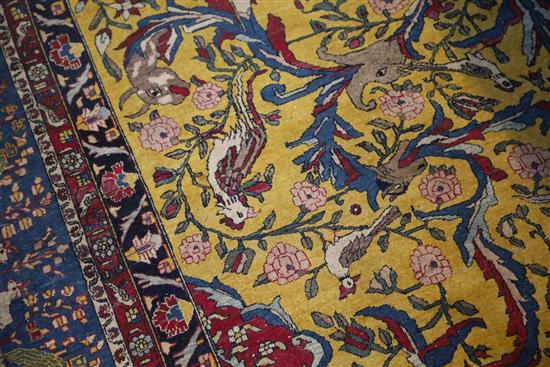 An antique North West Persian Tree of Life yellow ground carpet, 10ft by 6ft 11in.